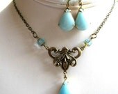 Light blue necklace set - glass teardrop stones - antiqued brass