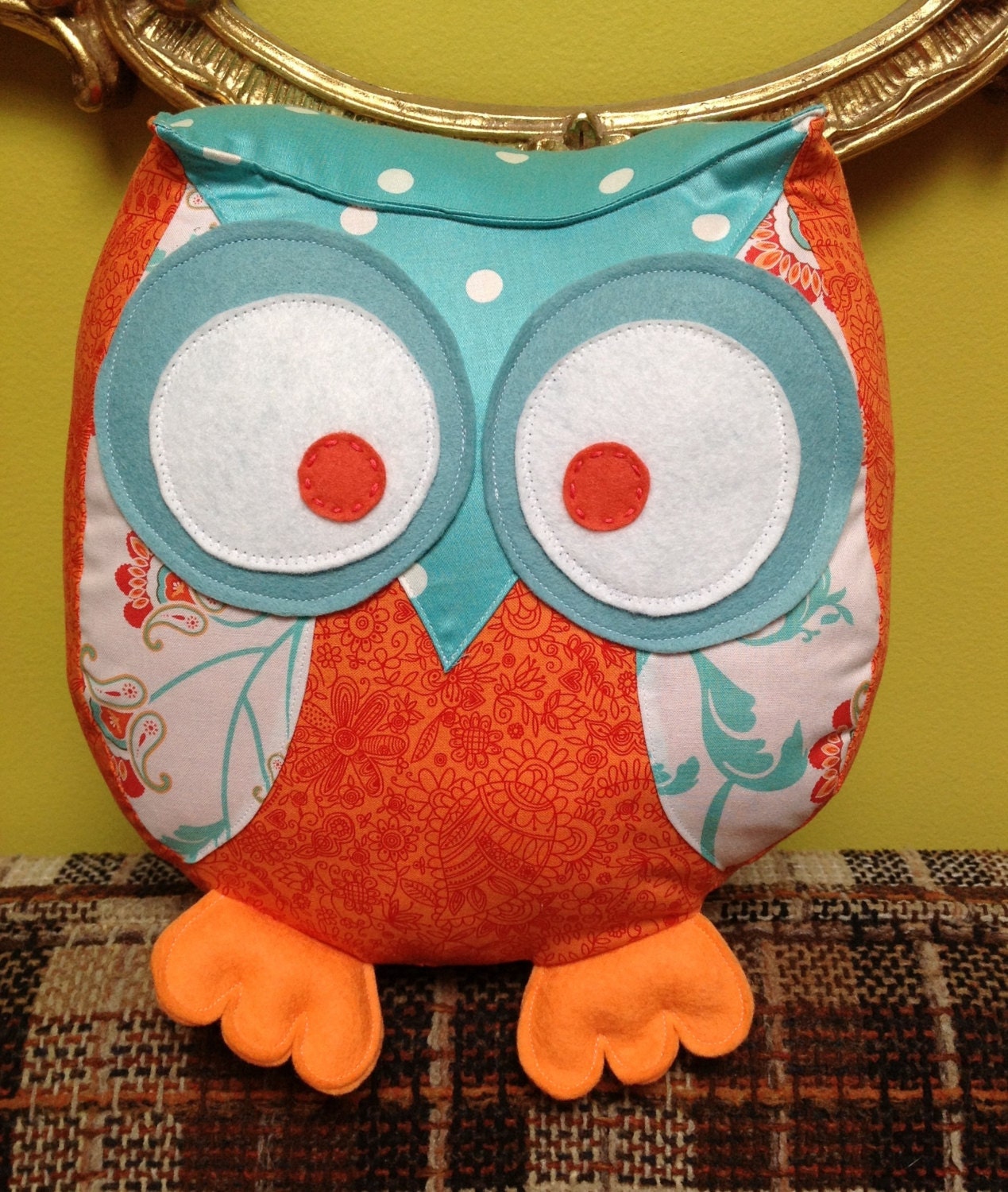 Chubby owl pillow in shades of aqua and orange
