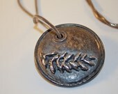 Antiqued metal clay pendant