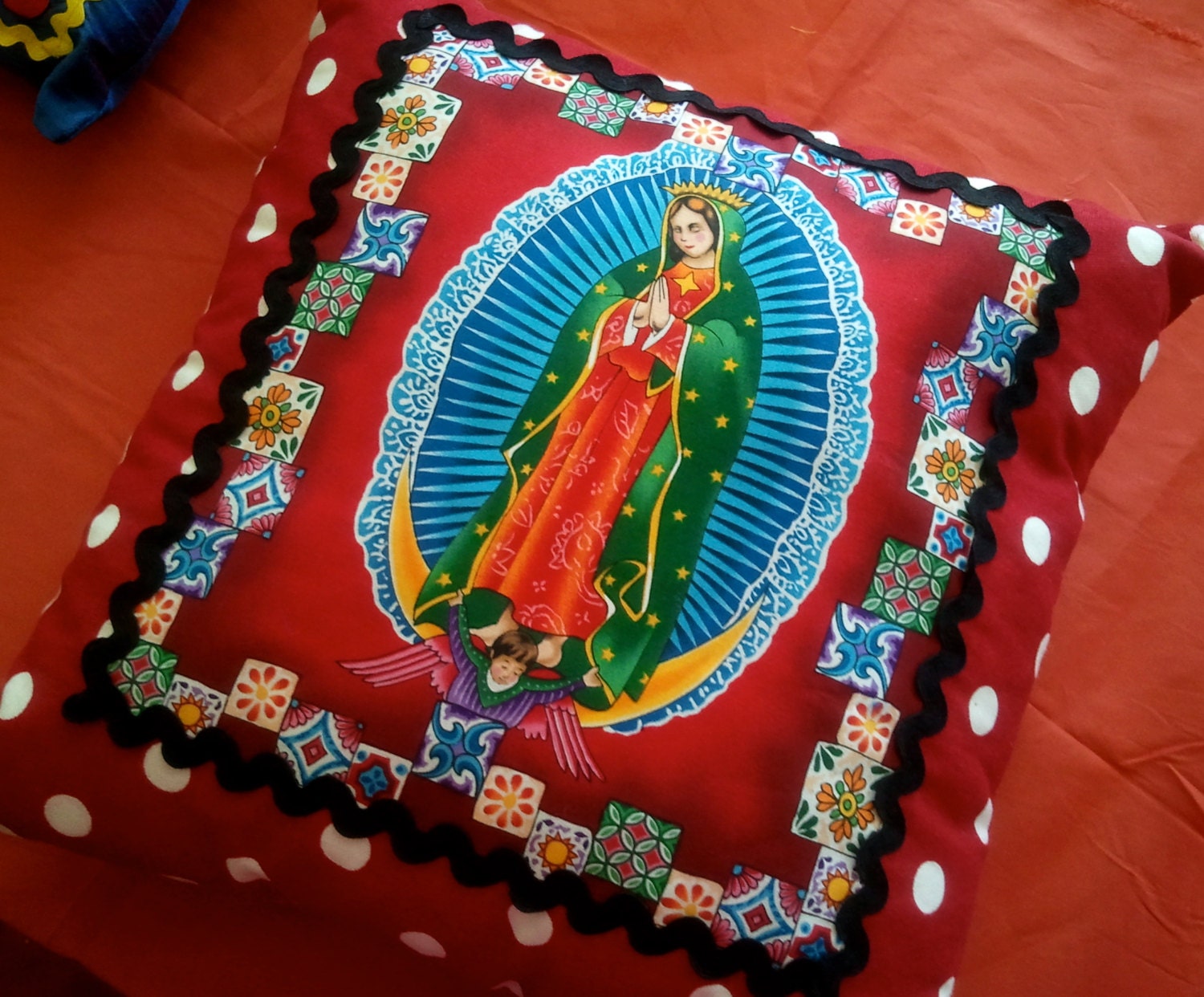Virgen de Guadalupe, Red With White Pok-A-Dot Pillow With Black Ric Rac Ribbon.
