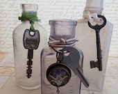 Three Old Vintage Apothecary Bottles With Skeleton Keys