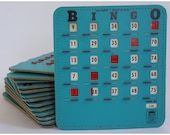 Set of 15 Vintage Turquoise Cardboard Bingo Cards with Red Sliders and Stitched Edging