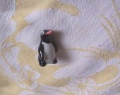 itty bitty miniature penguin figurine