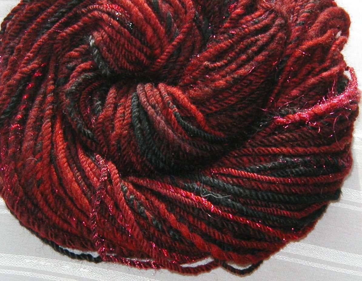 Poison Apple handspun chain-plied merino yarn with alpaca and sparkle