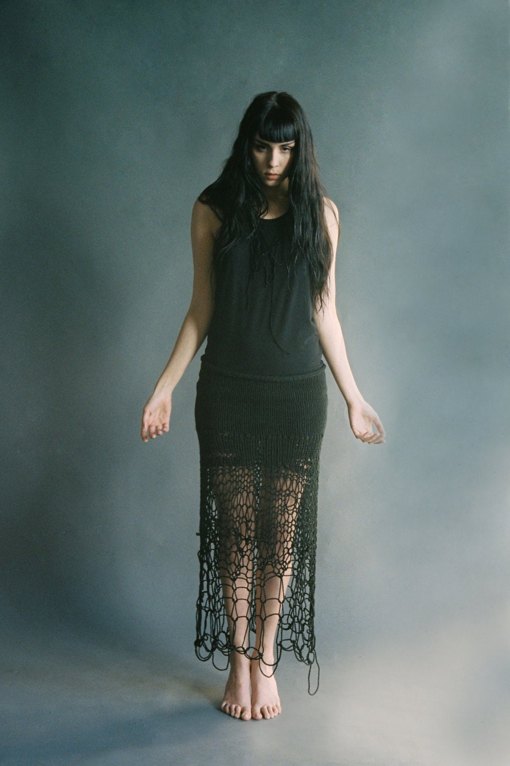 nerthus: black open-knit maxi skirt