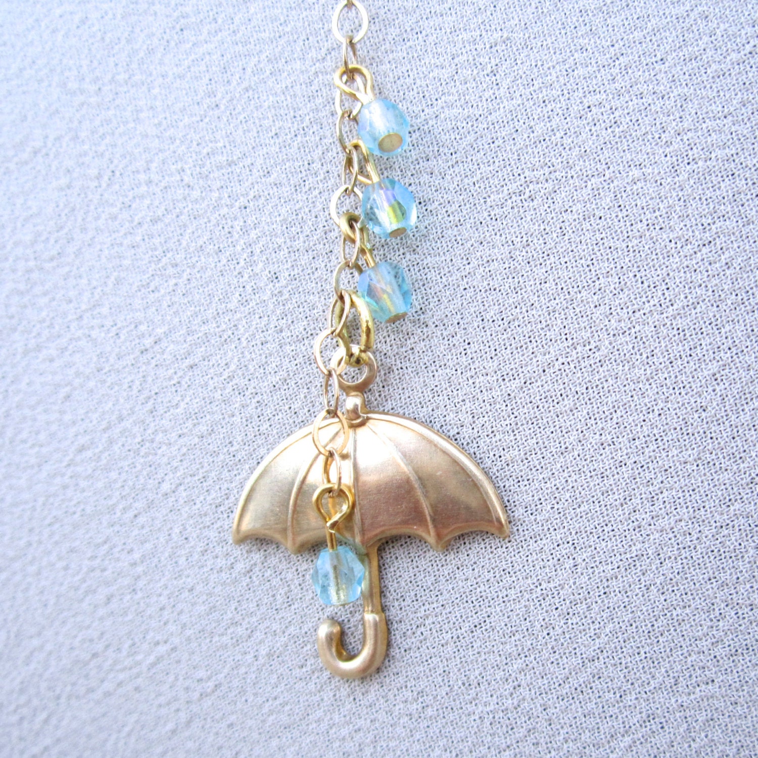 Raindrop Necklace - umbrella charm with blue crystal drops