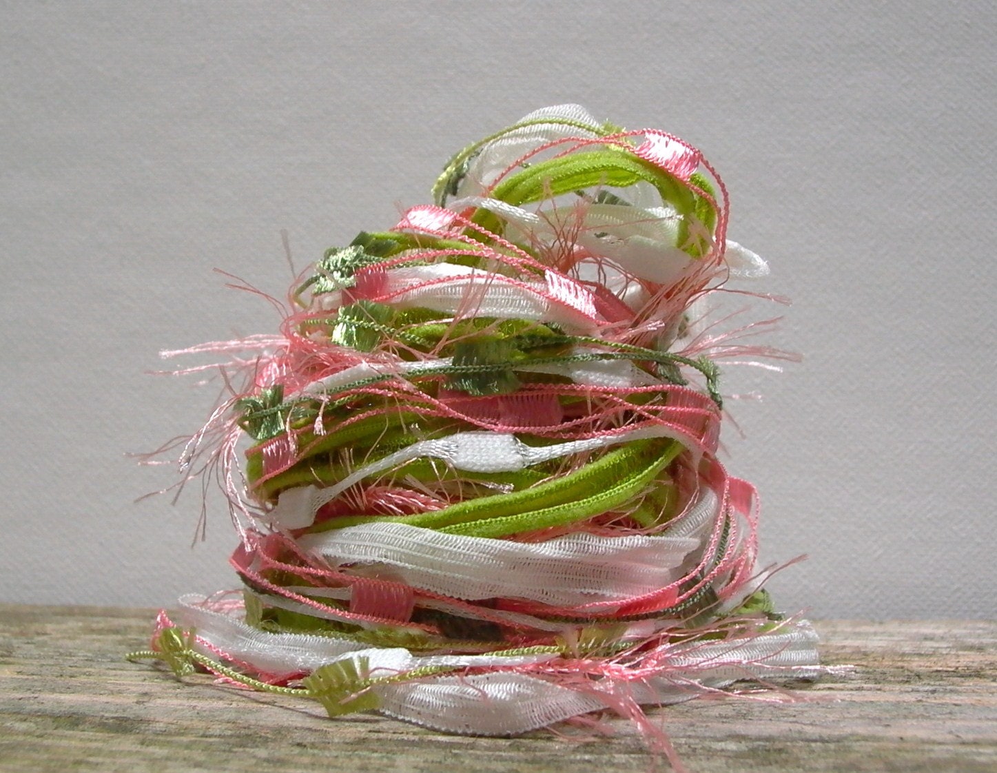 sushi roll fiber effects . 12yds specialty art yarn bundle . salmon pinkish orange avocado green white rice