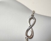Silver Infinity Bracelet on Silver Plate Chain