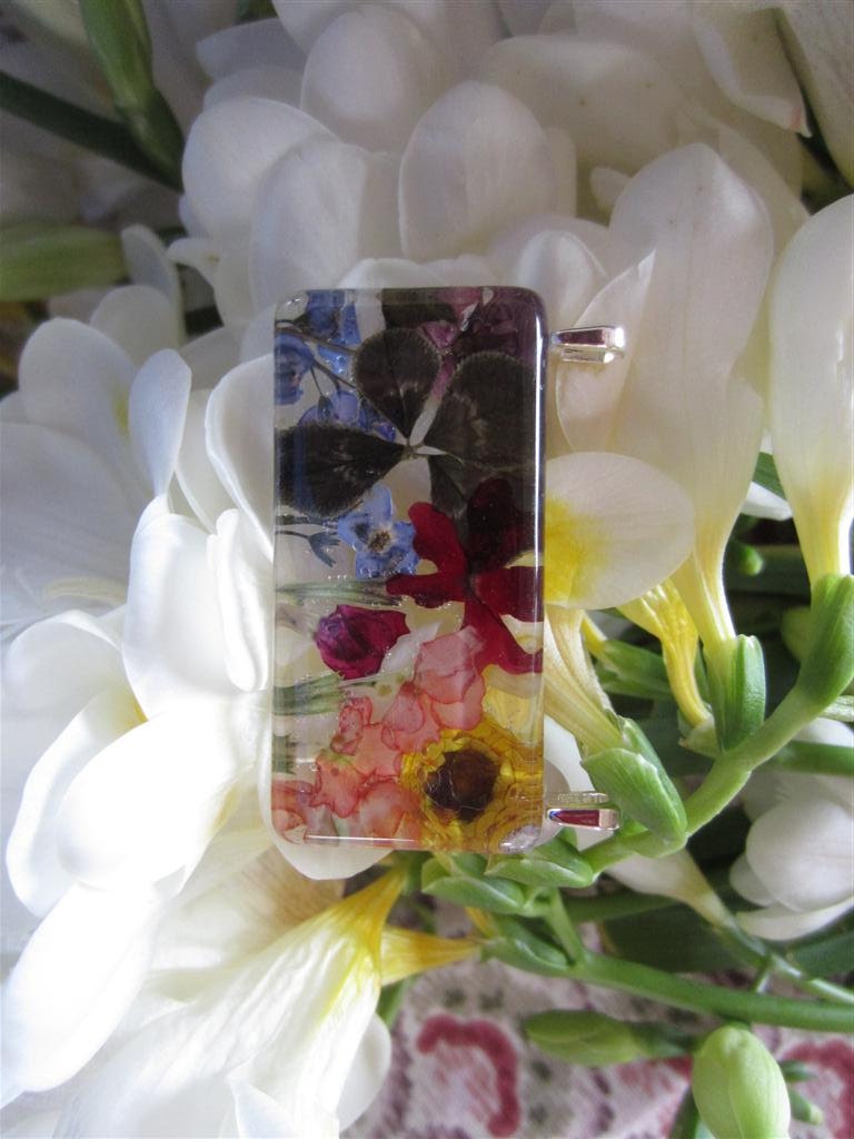 Miniature Panorma Real Flowers. Rainbow  Colors. Horizontal handcut crystal clear  glass 1 x 2 inches.