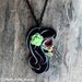 The Woman With A Rose Day of the Dead Necklace