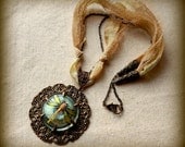 Large filigree pendant with iridescent dragonfly, statement necklace
