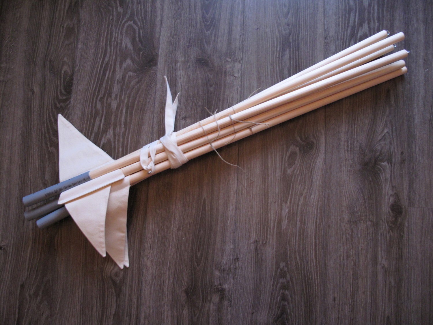 Poles - set of teepee poles, tie and flags.