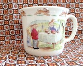 Bunnykins  Collectible CuP MuG . Sweet Picnic Cupcake Party Scene . Push Cart Love