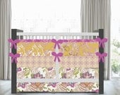 girl baby bedding   Bazaar Baby Bedding in sand and fushia includes bumper set , fitted sheet and crib skirt
