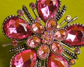 Pink cocktail statement ring. Large ring. Pink gems and rhinestones. Flower. Adjustable. Repurposed.