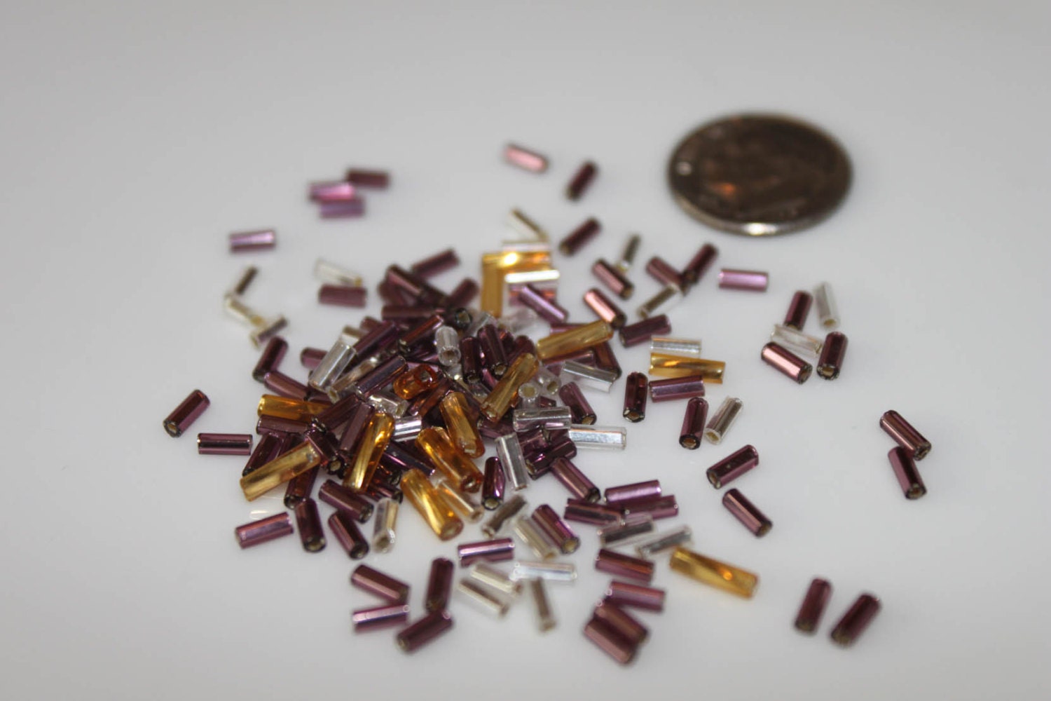 Mixture of Purple, Silver, and Gold Tubular Glass Beads - .5oz/15g