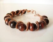 Copper coiled wire spiral red tiger eye bracelet on Etsy