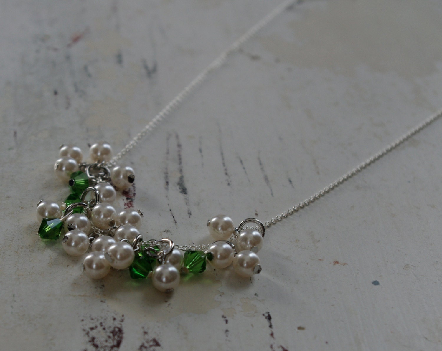 Sandy Hook HOPE line 20% donated to The Promise. 26 angels represented in green and white love on a delicate sterling chain.