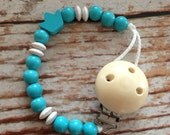 Pacifier chain holder