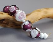 ROYAL PURPLE, set of 5 encased & decorated purple rounds and 4 spacers.