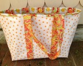Large retro oilcloth tote bag in tangerine polka dots