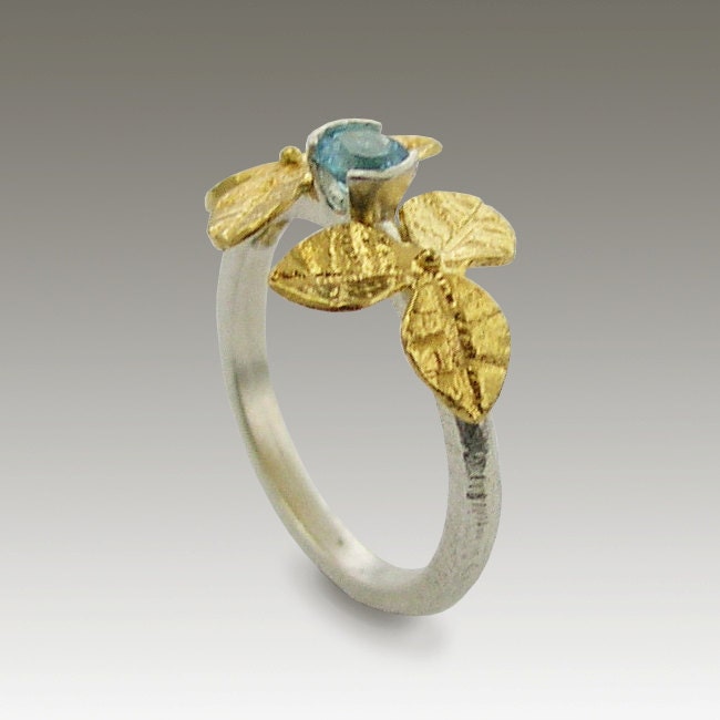 24k gold plated flower ring with Blue Topaz. - Brand New Day