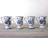 Blue and White Pottery Mugs with Windmill and Floral Design Set of Four