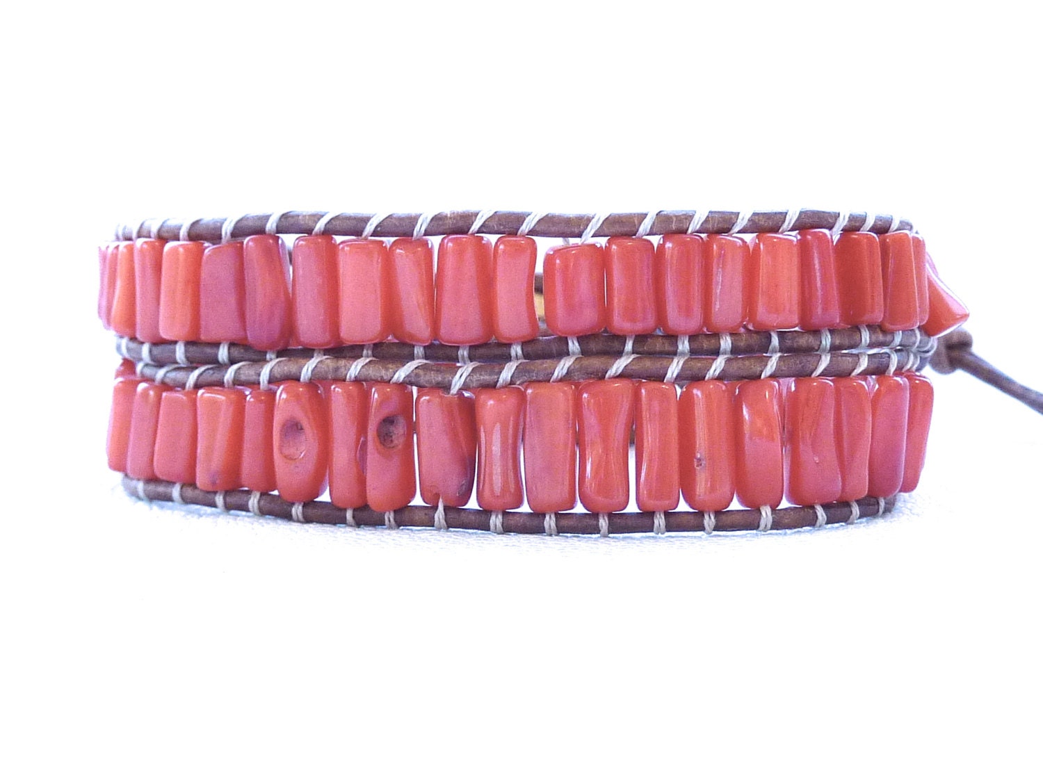 Red Bamboo Coral Wrap Bracelet on Saddle Brown Leather