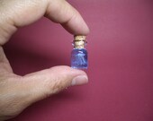 A super tiny jellyfish in a tiny bottle L