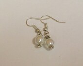 Creamy White Faux Pearls ... about 3/4 inch long ... earrings on Silver metal