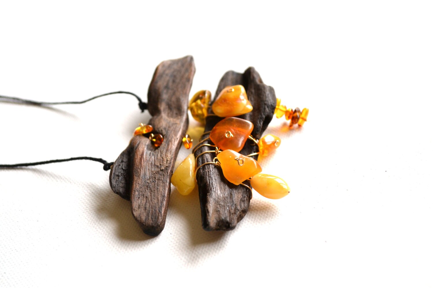 Handmade unique necklace from driftwood and natural Baltic Sea amber