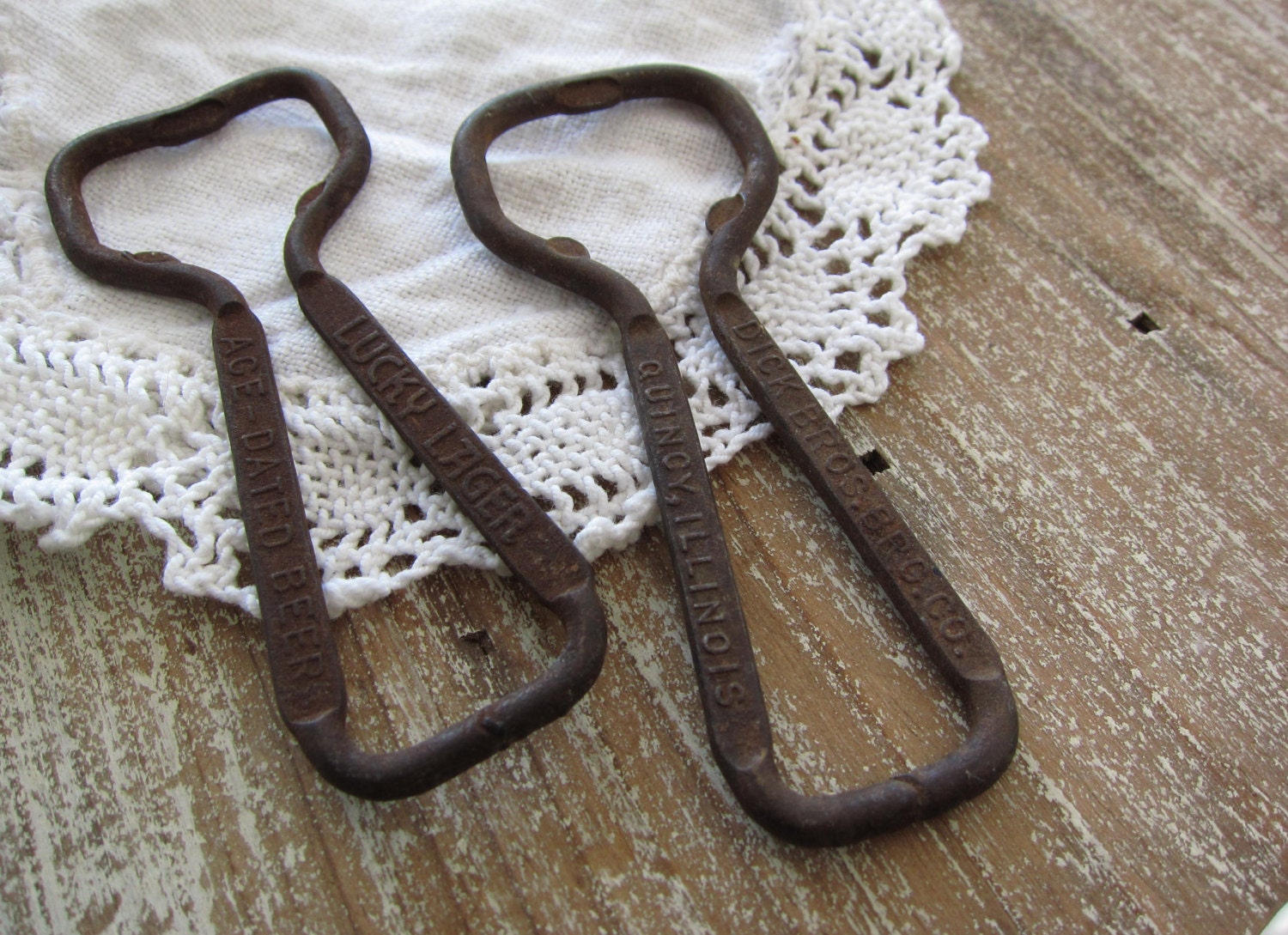Pair Old Bottle Openers