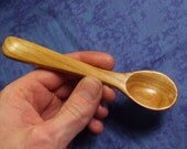 Hand carved child's spoon in cherry wood