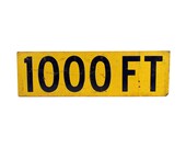 vintage wooden "1000 FT" sign
