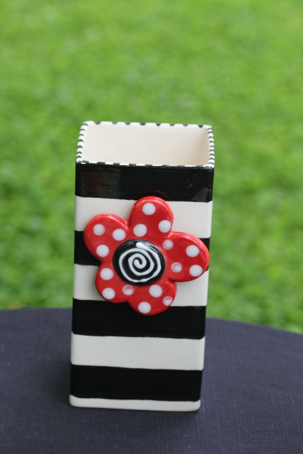 Whimsical vase with changeable charm