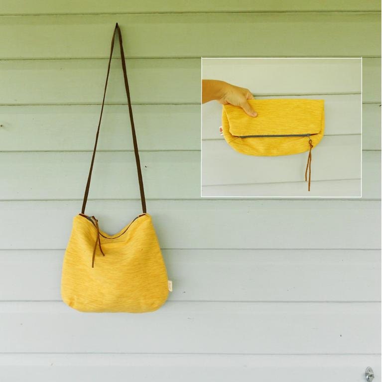 Yellow cross-body bag / fold over clutch with removable strap