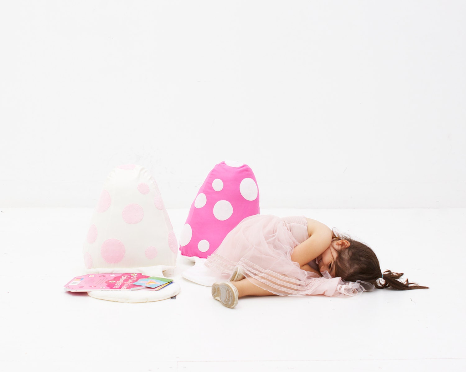 Toadstool cushion in pink and white