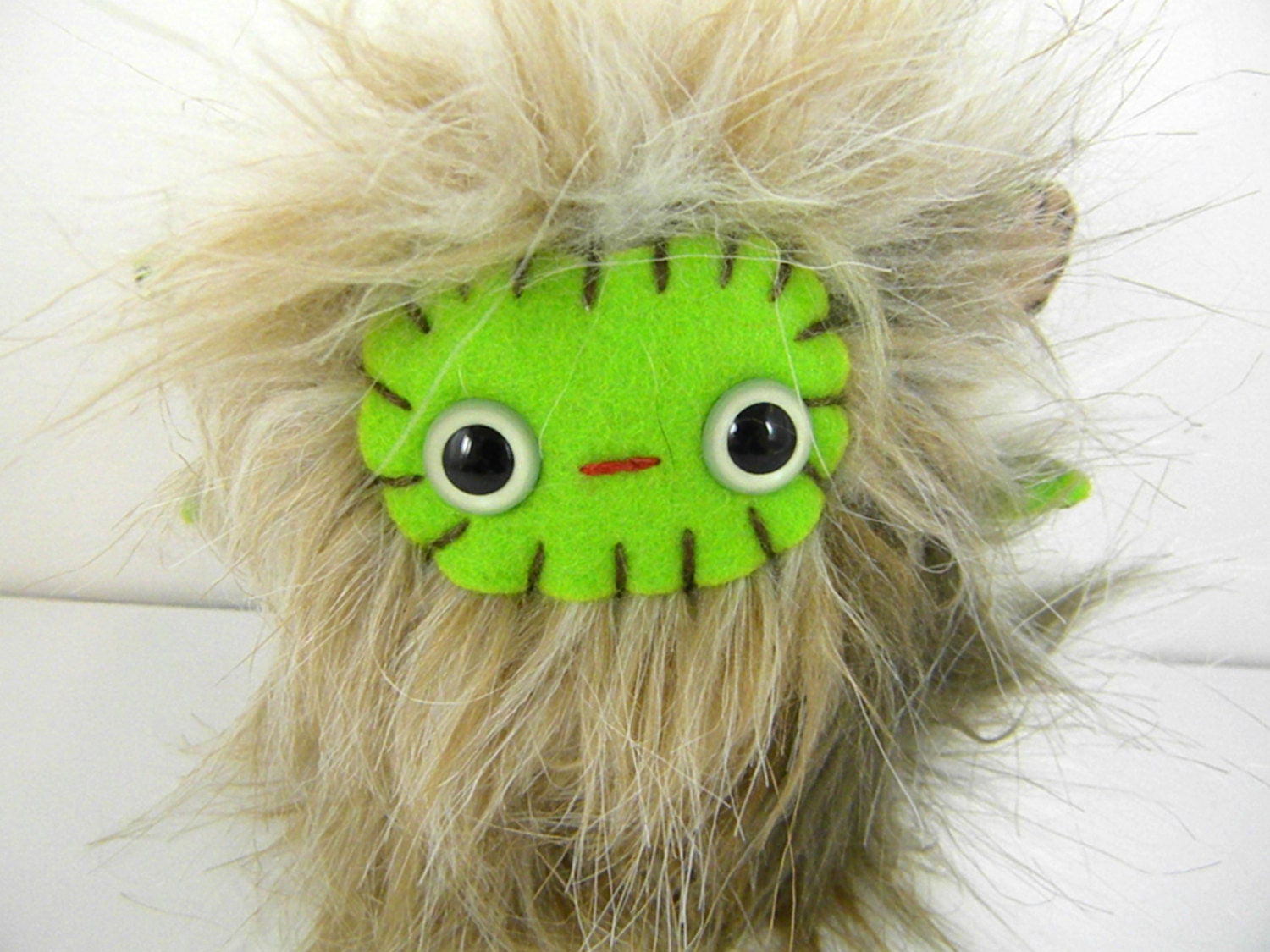 Bonks the plush monster miniature Little Tricksies brown and lime green stuffed animal