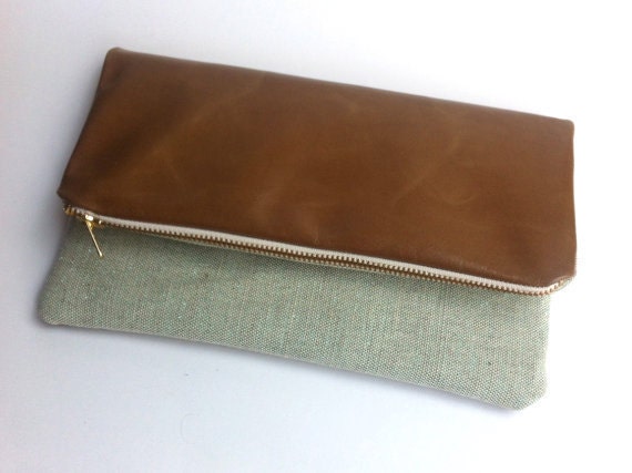 1 bag, 6 ways to style. Tan leather and metallic fabric clutch bag, small