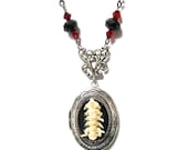 Steampunk Necklace Animal Bones Locket  by:Mechanique Steampunk