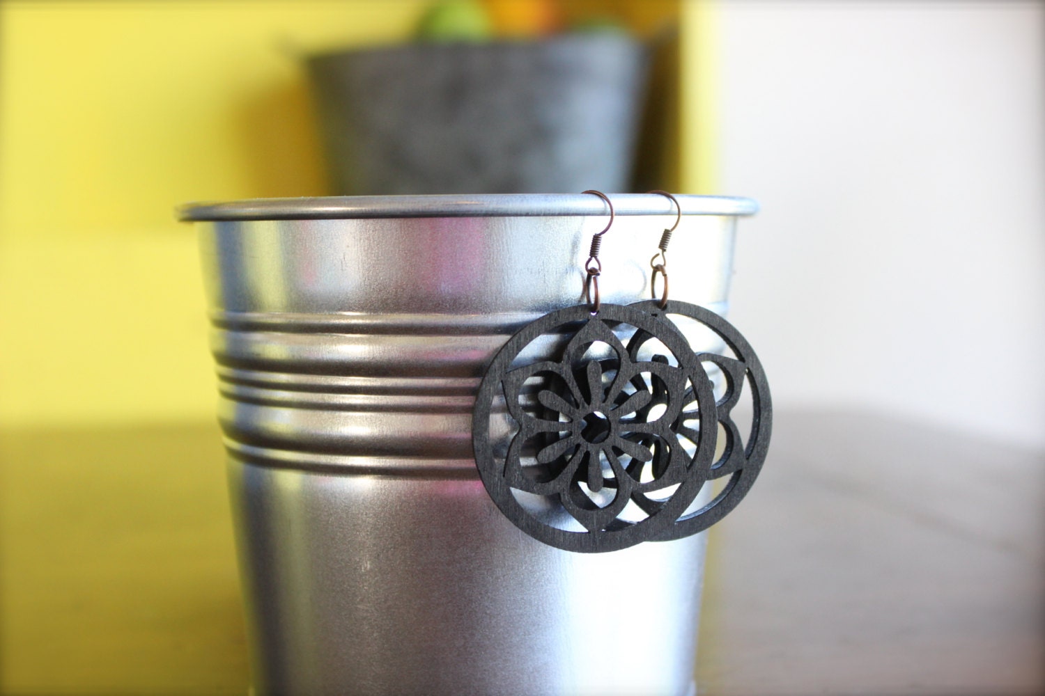 Black filigree earrings wood