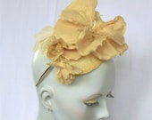 Buttery yellow floral fascinator headpiece ideal for weddings or summer partys