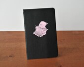 black moleskine journal: typewriter