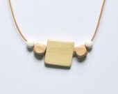 Geometric wooden bead necklace .  Natural & white