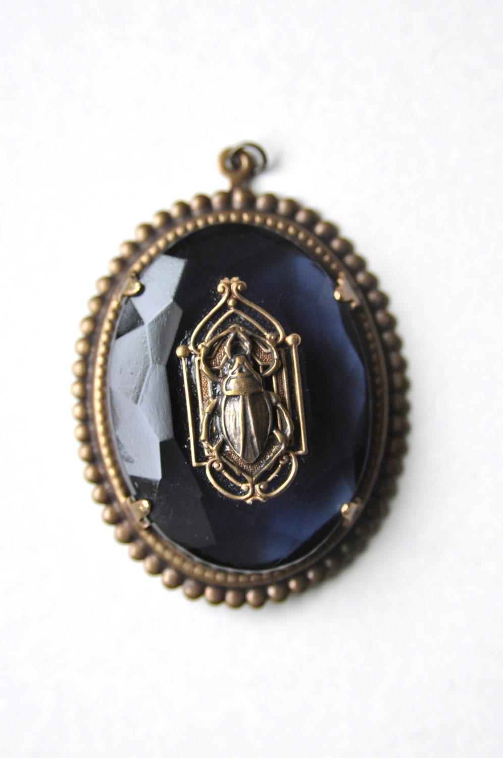 Egyptian revival style waterbug / scarab vintage montana blue glass pendant.