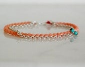 Pink coral and silver chain bracelet with silk cord