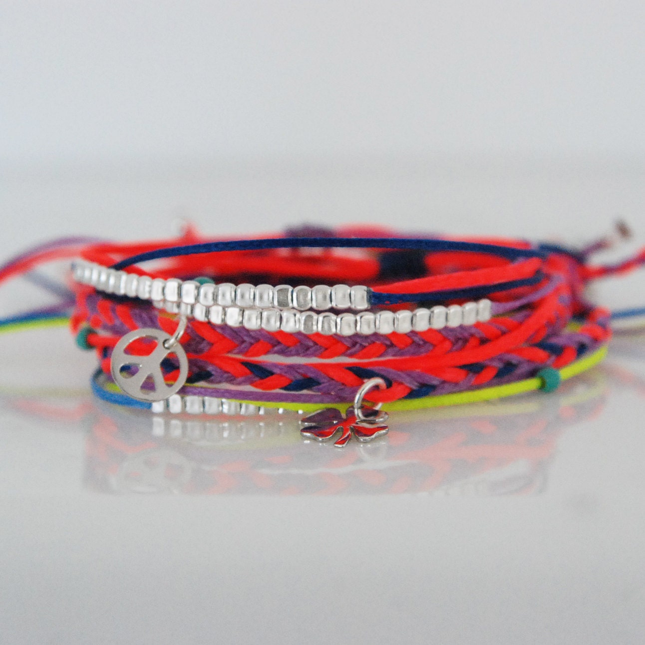 Layered dainty bracelet with hammered silver beads