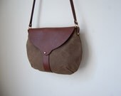 The Taplin Purse in Bark Tan Waxed Canvas with Emerald Teal Lining