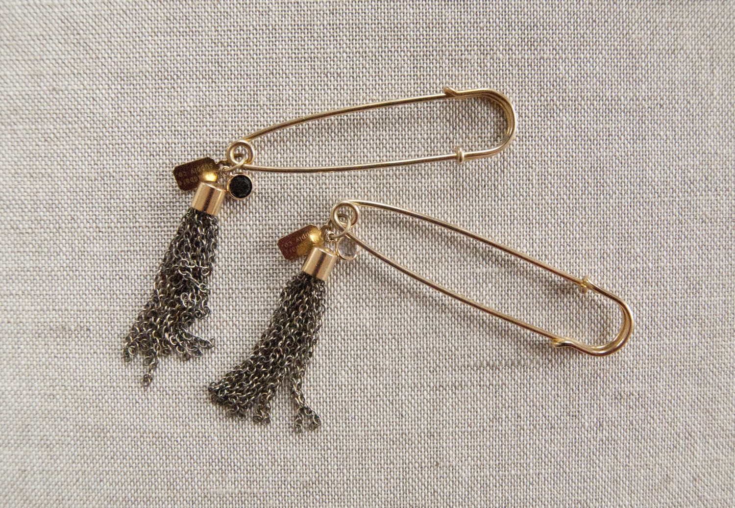 Embellished Safety Pin - Oversized brass pin with a jet Swarovski stone and chain tassel