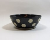 Black bowl with unglazed dots